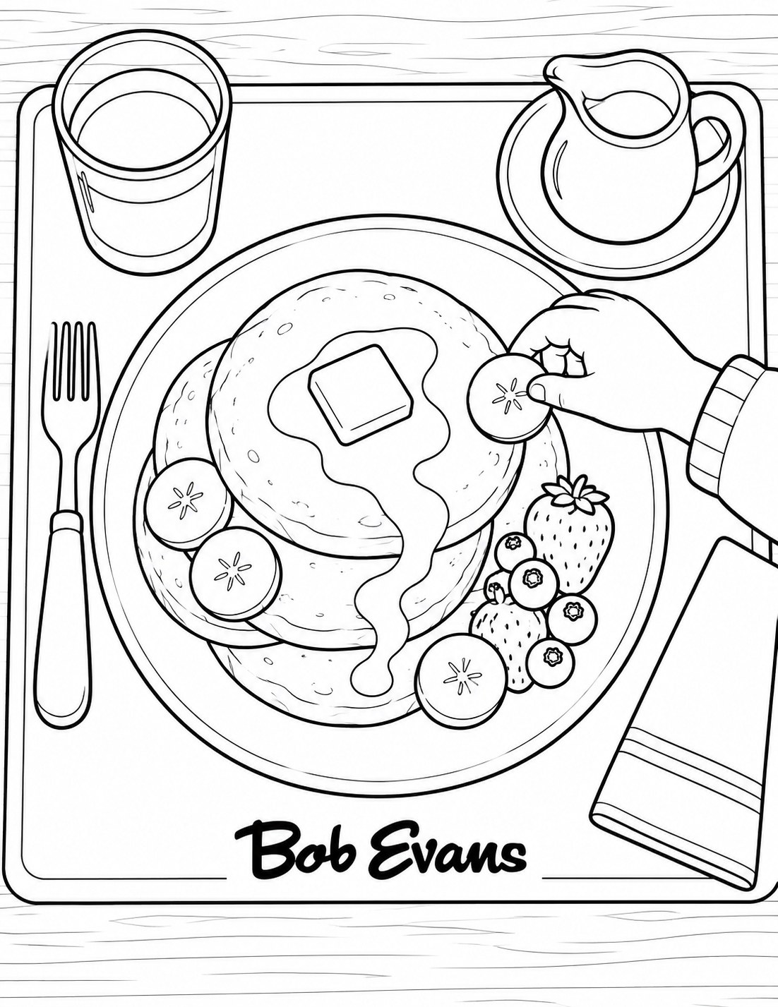 A child places the last banana slice beside a stack of pancakes topped with butter and syrup. Berries, a small pitcher and a water glass complete the breakfast setting, with Bob Evans along the placemat.